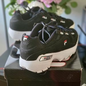 Men's size 9, Fila's D-Formation, Black w/white soles.